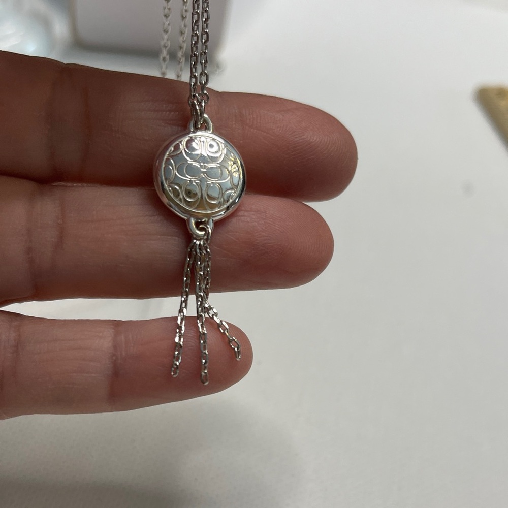 Elegant Coach Silver Tones Necklace with Intricate Coach C Logo Pendant - Picture 3 of 6